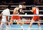 Canada's Shawn O'Sullivan (front) celebrates a silver medal win in the boxing event at the 1984 Olympic games in Los Angeles. (CP PHOTO/ COA/)