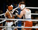 Canada's Shawn O'Sullivan (left) competes in the boxing event at the 1984 Olympic games in Los Angeles. (CP PHOTO/ COA/ Tim O'lett)