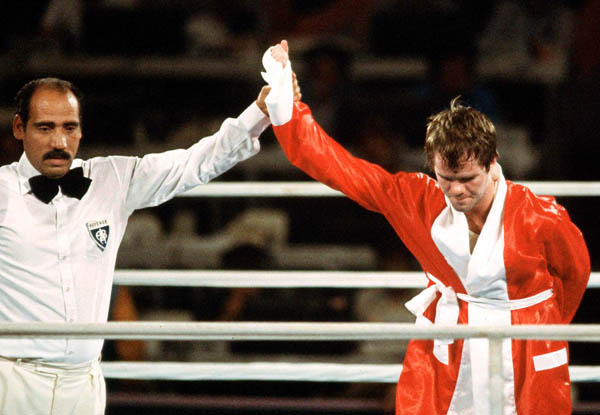 Canada's Shawn O'Sullivan is declared the winner of a boxing match at the 1984 Olympic games in Los Angeles. (CP PHOTO/ COA/ Tim O'lett)