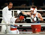 Canada's Shawn O'Sullivan (right) competes in the boxing event at the 1984 Olympic games in Los Angeles. (CP PHOTO/ COA/ Tim O'lett)
