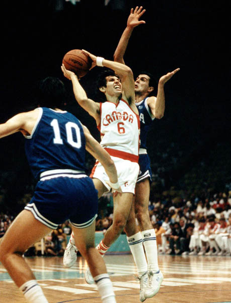 Canada's Eli Pasquale (6) playing basketball at the 1984 Olympic Games in Los Angeles. (CP PHOTO/COA/J. Merrithew)