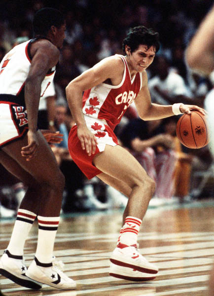 Canada's Eli Pasquale (right) plays basketball at the 1984 Olympic Games in Los Angeles. (CP PHOTO/COA/J. Merrithew)