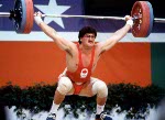 Canada's Albert Squires celebrates a successfull lift during weightlifting action at the 1984 Olympic games in Los Angeles. (CP PHOTO/ COA/Tim O'lett )