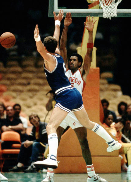 Canada's Tony Simms (behind) plays basketball at the 1984 Olympic Games in Los Angeles. (CP PHOTO/COA/J. Merrithew)