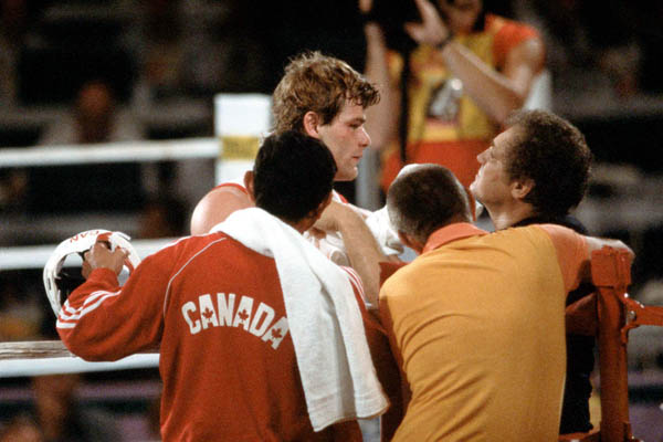 Canada's Willie Dewit (centre) competes in the boxing event at the 1984 Olympic games in Los Angeles. (CP PHOTO/ COA/ Tim O'lett)