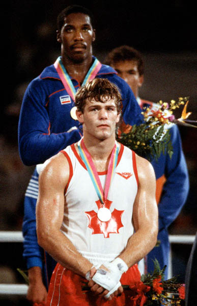 Canada's Willie Dewit (front) celebrates a silver medal win in the boxing event at the 1984 Olympic games in Los Angeles. (CP PHOTO/ COA/)