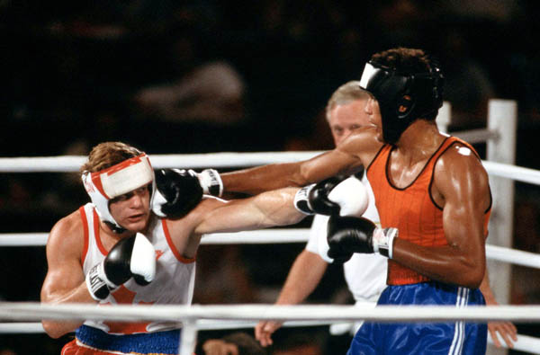 Canada's Willie Dewit (left) competes in the boxing event at the 1984 Olympic games in Los Angeles. (CP PHOTO/ COA/ Tim O'lett)