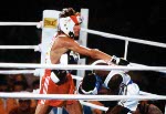Canada's coach Wayne Gordon (left) paticipates at the boxing event at the 1996 Atlanta Summer Olympic Games. (CP Photo/COA/Scott Grant)