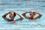 Canada's Sharon Hambrook (left) and Kelly Kryczka perform their synchronized swimming routine at the 1984 Los Angeles Olympic Games. (CP Photo/ COA/ Tim O'lett)