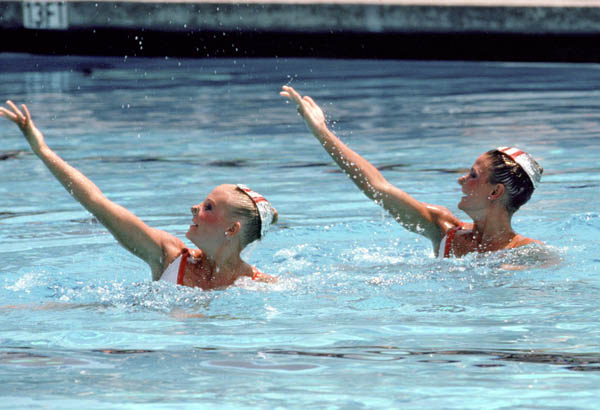 Canada's Sharon Hambrook (left) and Kelly Kryczka perform their synchronized swimming routine at the 1984 Loas Angeles Olympic Games. (CP Photo/ COA/ Tim O'lett)