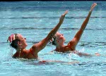 Canada's Sharon Hambrook (right) and Kelly Kryczka perform their synchronized swimming routine at the 1984 Loas Angeles Olympic Games. (CP Photo/ COA/ Tim O'lett)