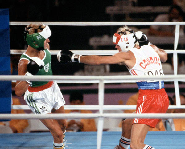 Canada's Steve Pagendam (right) competes in the boxing event at the 1984 Olympic games in Los Angeles. (CP PHOTO/ COA/ Tim O'lett)