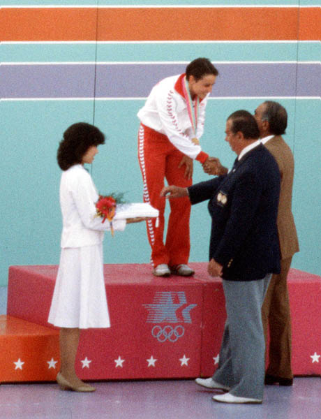Canada's Sylvie Bernier celebrates a gold medal win in the women's diving event at the 1984 Olympic games in Los Angeles. (CP PHOTO/ COA/Ted Grant)