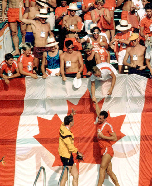 Canada's Victor Davis (bottom) celebrates a gold medal win in the men's swimming event at the 1984 Olympic games in Los Angeles. (CP PHOTO/ COA/)