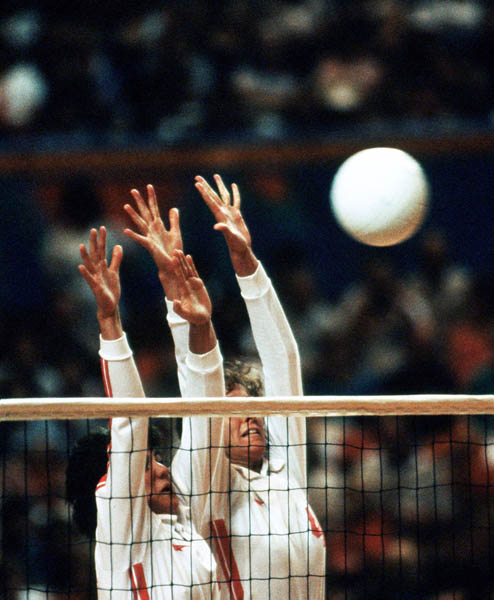 Canada's Rachel Beliveau (left) and Joyce Gamborg jump for a block in the women's volleyball event at the 1984 Los Angeles Summer Olympic Games. (CP PHOTO/COA/Scott Grant)