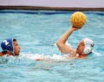 Canada's George Gross (right) competes in the men's water polo event at the 1984 Olympic Games Los Angeles. (CP Photo/COA/Tim O'lett)