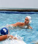 Canada's Rick Zayonc (goalie) and Bill Meyer (9) compete in men's water polo action at the 1984 Olympic Games Los Angeles. (CP Photo/COA/Tim O'lett)