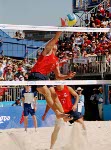 Canada's Mark Heese (left)  and John Child (right)   in action during a beach volleyball tournament  at the Sydney 2000 Olympic Games. (CP PHOTO/ COA)