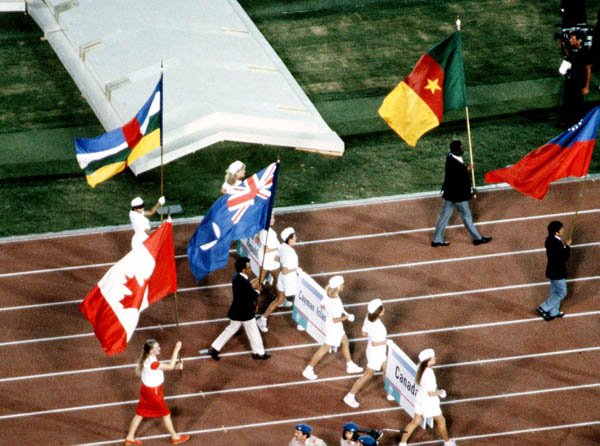 The Canadian flag is carried during the closing ceremonies of the 1984 Olympic games in Los Angeles. (CP PHOTO/ COA/ Tim O'lett)
