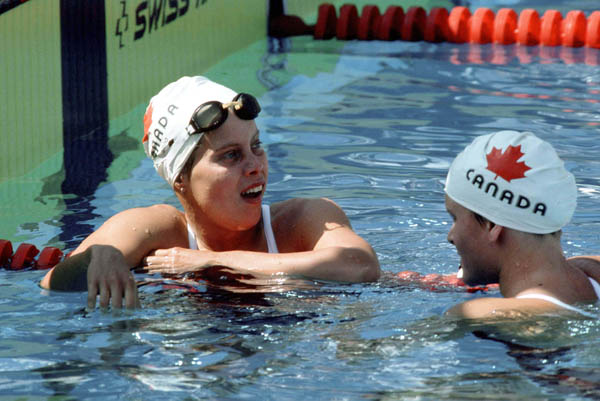 Canada's Mary Lubawski (left) and Anne Ottenbrite competes in the swimming event at the 1984 Olympic games in Los Angeles. (CP PHOTO/ COA/Ted Grant )