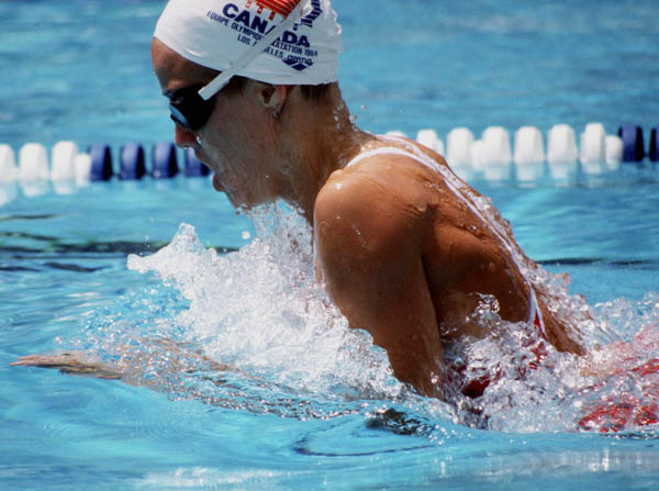 Canada's Cindy Ounpuu competes in the swimming event at the 1984 Olympic games in Los Angeles. (CP PHOTO/ COA/Ted Grant )