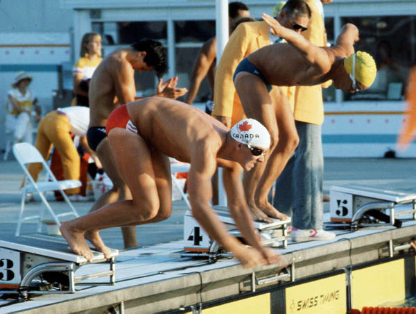 Canada's Tom Ponting (left) competes in the swimming event at the 1984 Olympic games in Los Angeles. (CP PHOTO/ COA/Ted Grant )