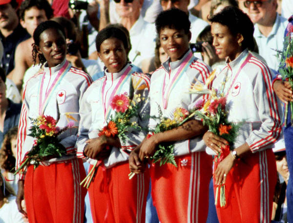 Canada's women's relay team celebrates their silver medal win in the 4x400m event at the 1984 Olympic games in Los Angeles. (CP PHOTO/ COA/J. Merrithew)