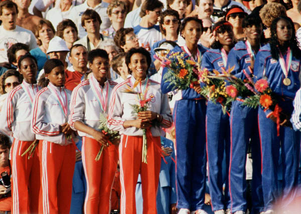 Canada's women's relay team (left) celebrates their silver medal win in the 4x400m event at the 1984 Olympic games in Los Angeles. (CP PHOTO/ COA/J. Merrithew)