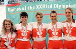 Canada's women's 4+ rowing team celebrate their silver medal win in the rowing event at the 1984 Olympic games in Los Angeles. (CP PHOTO/ COA/Ted Grant)