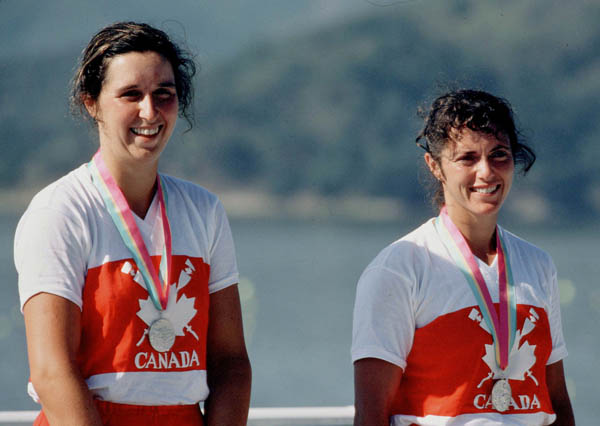 Canada's Trisha Smith (left) and Betty Craig celebrate a silver medal win in the women's 2- rowing event at the 1984 Olympic games in Los Angeles. (CP PHOTO/ COA/)