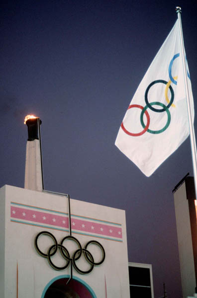 The Olympic Flame and the Olympic flag are shown at the 1984 Winter Olympics in Los Angeles. (CP PHOTO/COA/ Jim Merrithew)