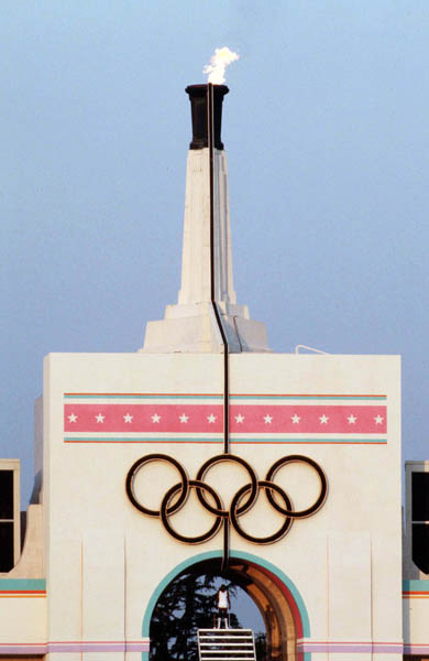 An athlete lights the Olympic Flame at the opening ceremonies for the 1984 Winter Olympics in Los Angeles. (CP PHOTO/COA/ Jim Merrithew)