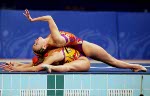 Canada's Fanny Letourneau and Claire Carver-Dias begin their synchronized swimming routine at the 2000 Sydney Olympic Games. (CP Photo/ COA)