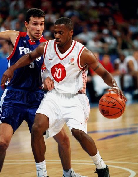 Canada's Greg Francis participates in basketball action at the 2000 Sydney Olympic Games. (CP Photo/ COA)