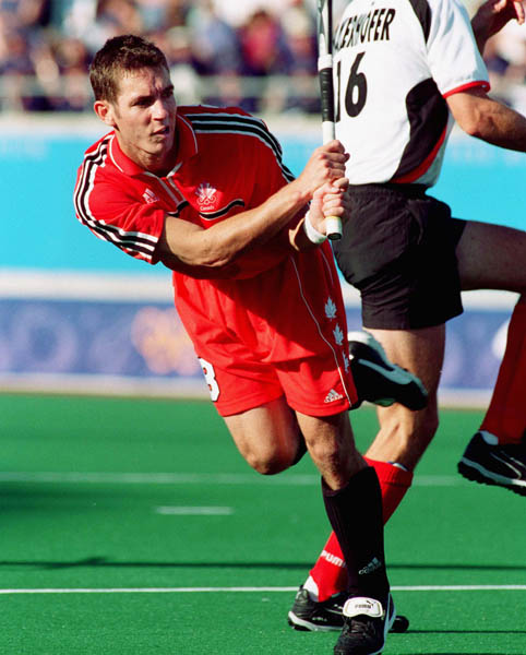 Canada's Andrew Griffiths plays field hockey at the 2000 Sydney Olympic Games. (CP Photo/ COA)