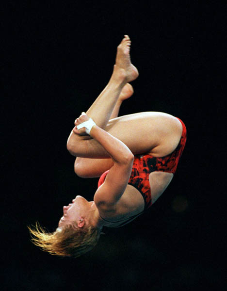 Canada's Emilie Heymans floats in mid-air as she performs a dive at the Sydney 2000 Olympic Games. (CP PHOTO/ COA)