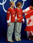 Canada's diving team (right), Emilie Heymans and Anne Montminy,, celebrates their silver medal win in the synchronized diving event at the 2000 Sydney Olympic games. (CP PHOTO/ COA)