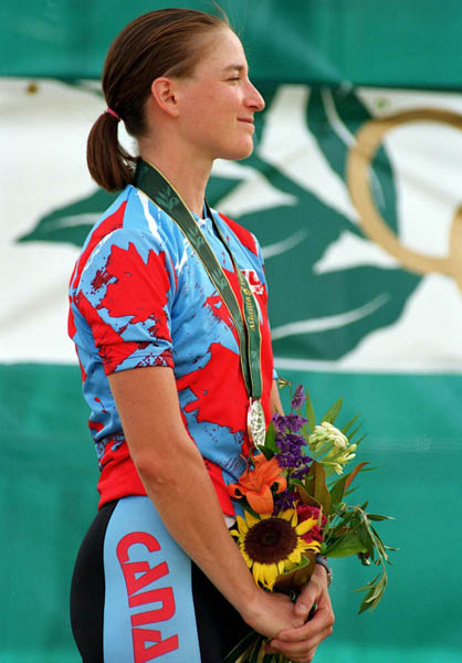 Canada's Alison Sydor celebrates a silver medal win in the women's cross country cycling event at the 1996 Atlanta Summer Olympic Games. (CP Photo/ COA/Mike Ridewood)