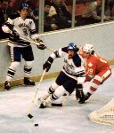 Canada's Ken Berry (right) participates in hockey action against Poland at the 1980 Winter Olympics in Lake Placid. (CP PHOTO/ COA/ )