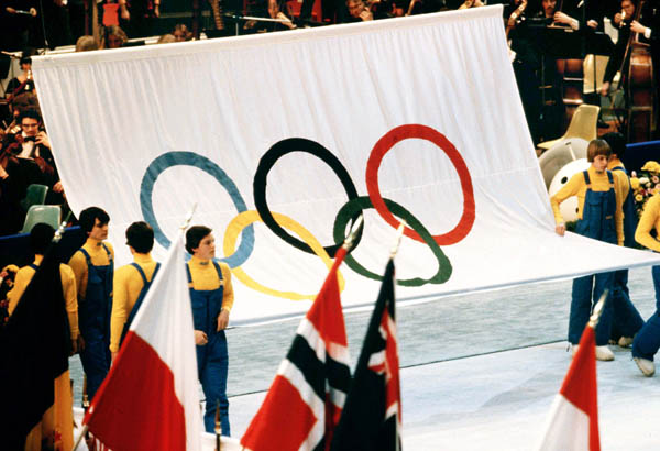 The Olympic flag is lowered during closing ceremonies at the 1980 Winter Olympics in Lake Placid. (CP Photo/COA)
