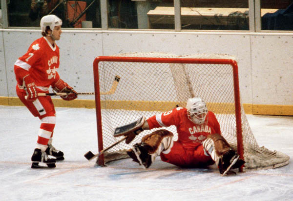 Canada's Joe Grant (7) and Paul Pageau (goalie) participate in hockey action against the Netherlands at the 1980 Winter Olympics in Lake Placid. (CP PHOTO/ COA/ )