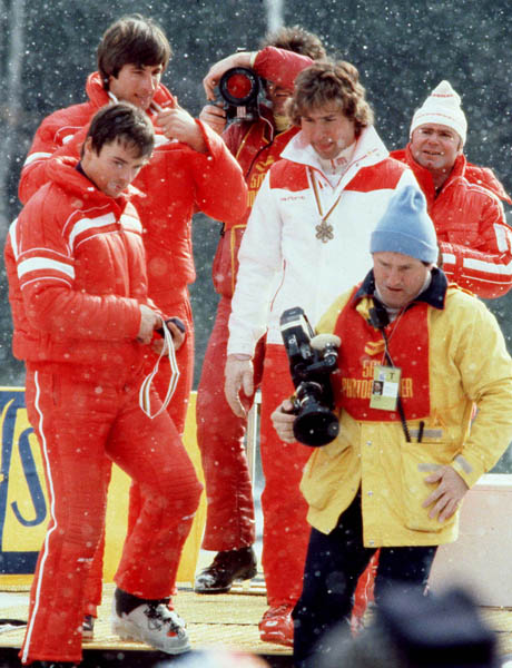 Steve Podborski (white) celebrates his bronze medal win in the alpine ski event at the 1980 Lake Placid Olympic winter Games. (CP PHOTO/COA)