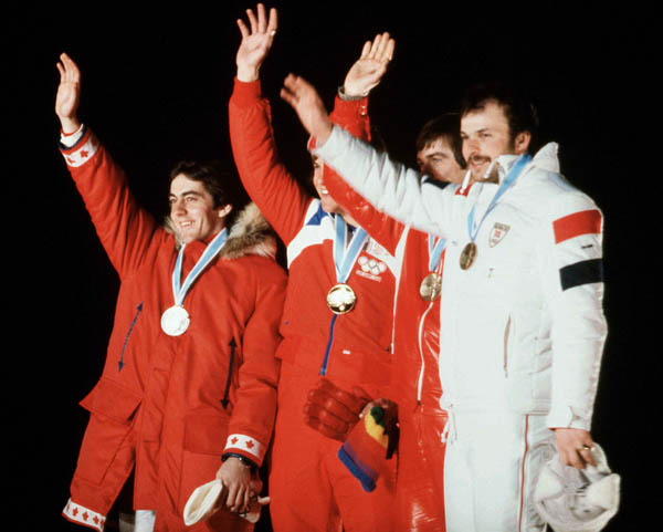 Canada's Gaetan Boucher (left) celebrates his silver medal win in the speed skating event at the 1980 Lake Placid Olympic winter Games. (CP Photo/COA)