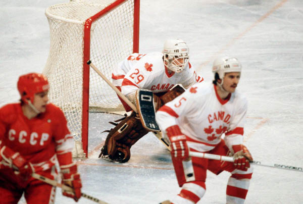 Canada's Paul Pageau (goalie) and Tim Watters (5) compete in hockey action against the U.S.S.R. at the 1980 Winter Olympics in Lake Placid. (CP Photo/ COA)