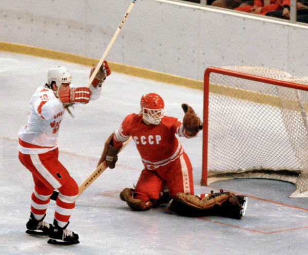 Canada's Dan D'Alvise (left) competes in hockey action against the U.S.S.R. at the 1980 Winter Olympics in Lake Placid. (CP Photo/ COA)