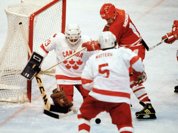 Canada's Paul Pageau (goalie) and Tim Watters participate in hockey action against the U.S.S.R. at the 1980 Winter Olympics in Lake Placid. (CP Photo/ COA)