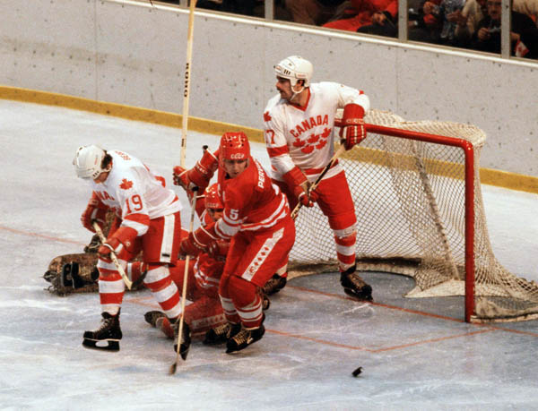 Canada's Ken Berry (19) and Paul McLean (17) compete in hockey action against the U.S.S.R. at the 1980 Winter Olympics in Lake Placid. (CP Photo/ COA)