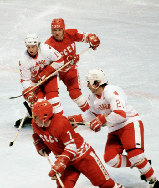 Canada's John Devaney (left) and Kevin Primeau (right) compete in hockey action against the U.S.S.R. at the 1980 Winter Olympics in Lake Placid. (CP Photo/ COA)