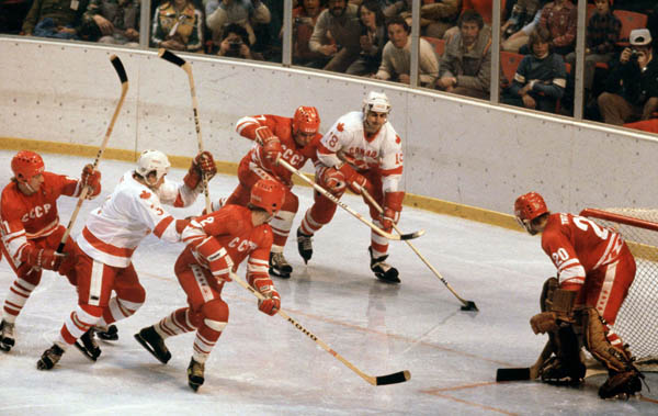Canada's Brad Pirie (left) and Dan D'Avise (right)  compete in hockey action against the U.S.S.R. at the 1980 Winter Olympics in Lake Placid. (CP Photo/ COA)