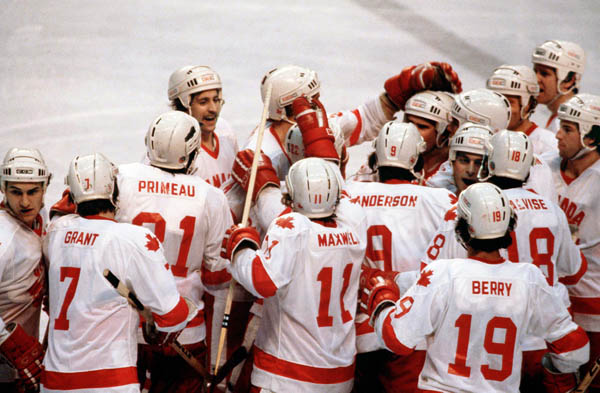 Team Canada celebrates a win in hockey action at the 1980 Winter Olympics in Lake Placid. (CP Photo/ COA)
